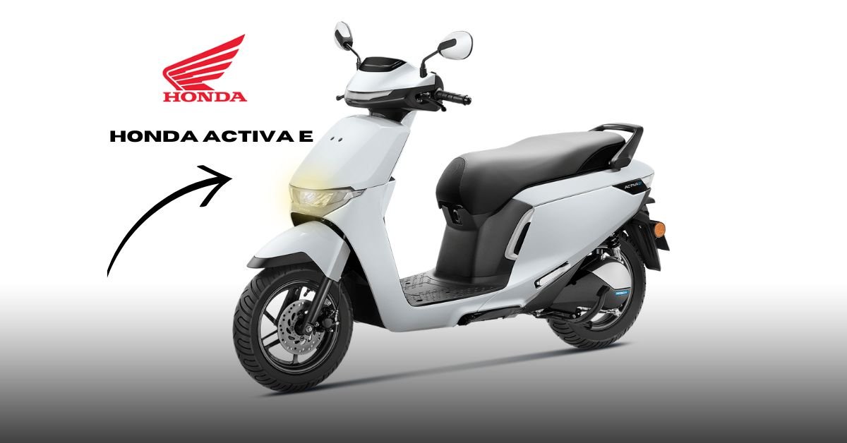 Honda Activa e plugged into a home charging station, highlighting its eco-friendly and practical design